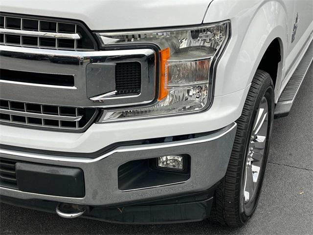 used 2018 Ford F-150 car, priced at $26,487