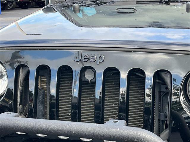 used 2018 Jeep Wrangler JK Unlimited car, priced at $22,457