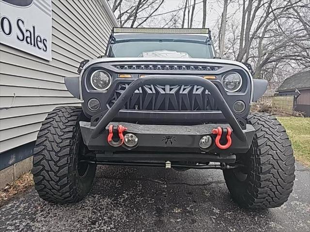 used 2011 Jeep Wrangler Unlimited car, priced at $18,956