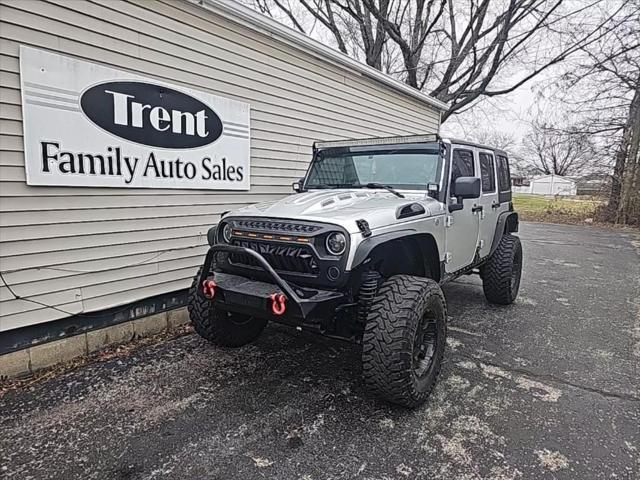 used 2011 Jeep Wrangler Unlimited car, priced at $18,956