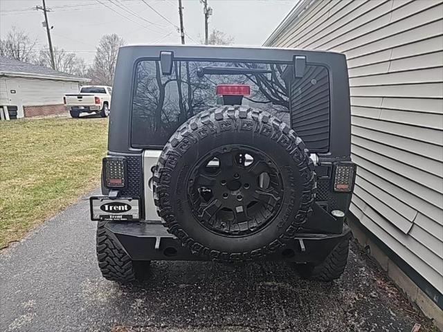 used 2011 Jeep Wrangler Unlimited car, priced at $18,956