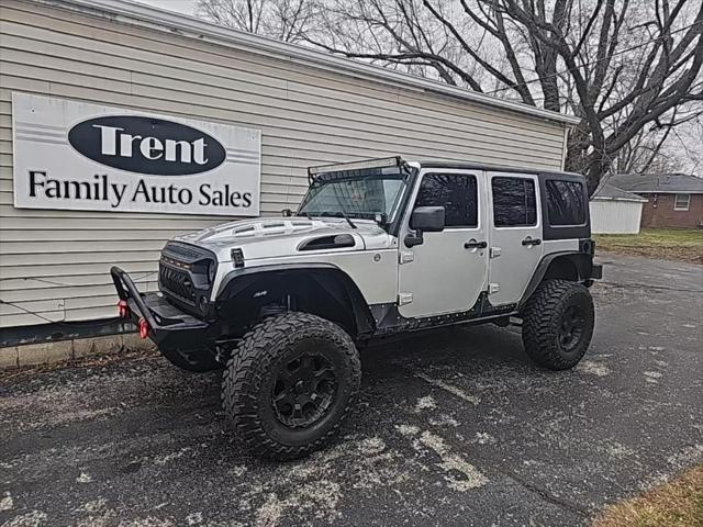 used 2011 Jeep Wrangler Unlimited car, priced at $18,956