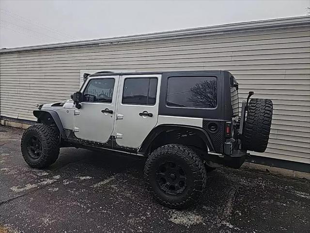 used 2011 Jeep Wrangler Unlimited car, priced at $18,956