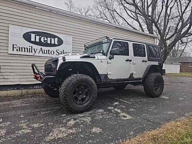 used 2011 Jeep Wrangler Unlimited car, priced at $18,956