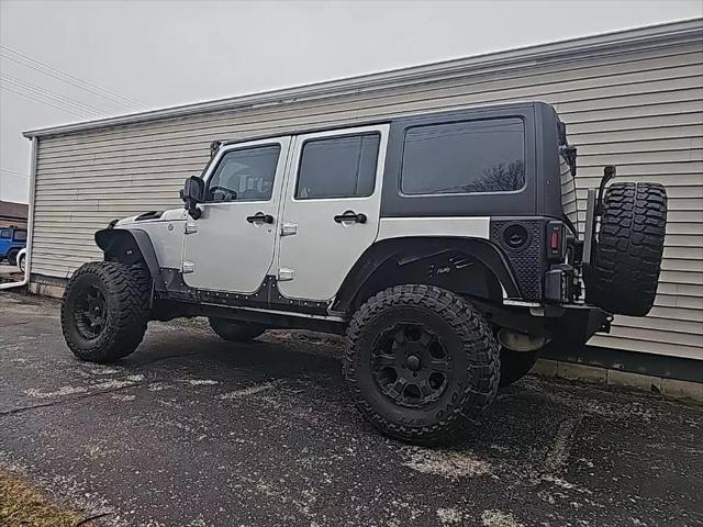 used 2011 Jeep Wrangler Unlimited car, priced at $18,956