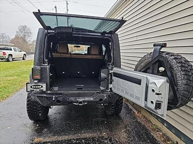 used 2011 Jeep Wrangler Unlimited car, priced at $18,956