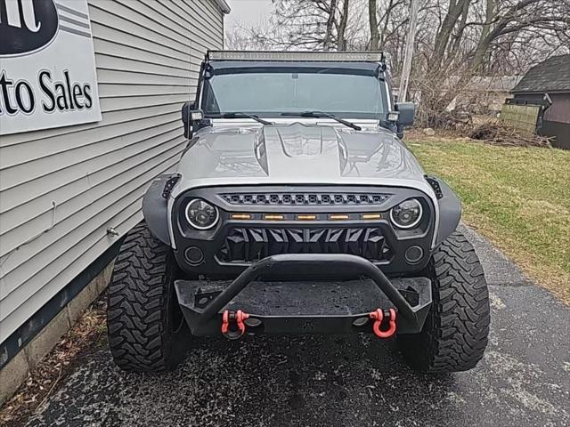 used 2011 Jeep Wrangler Unlimited car, priced at $18,956