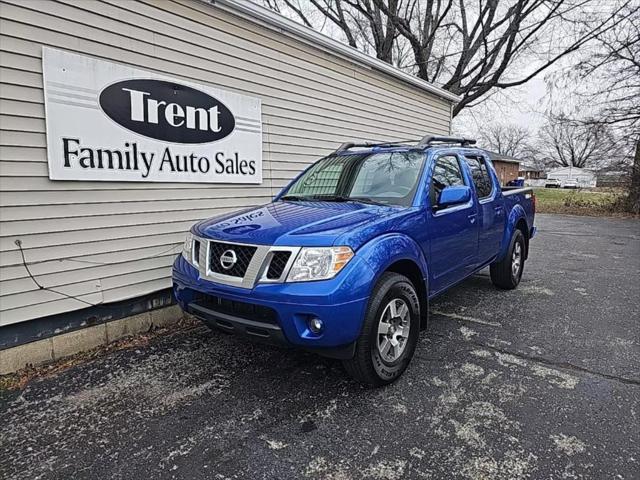 used 2013 Nissan Frontier car, priced at $16,579