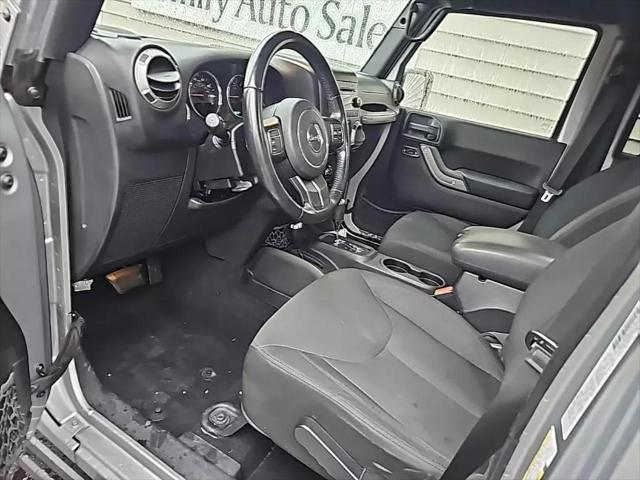 used 2015 Jeep Wrangler Unlimited car, priced at $20,675