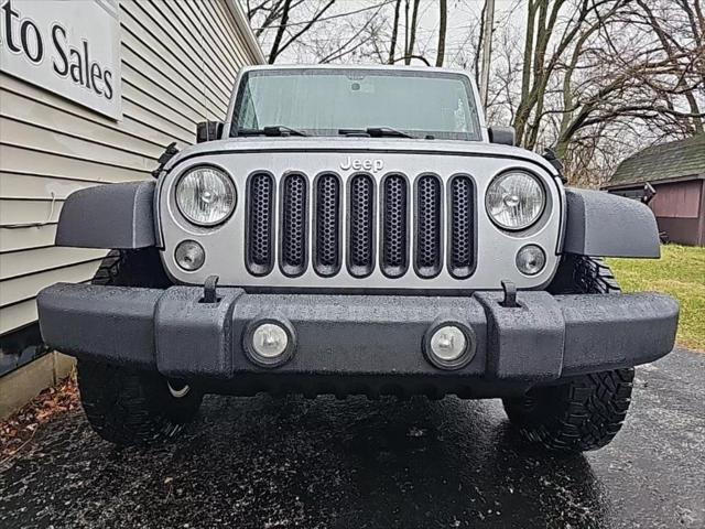 used 2015 Jeep Wrangler Unlimited car, priced at $20,675