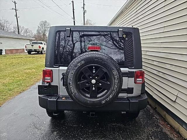 used 2015 Jeep Wrangler Unlimited car, priced at $20,675