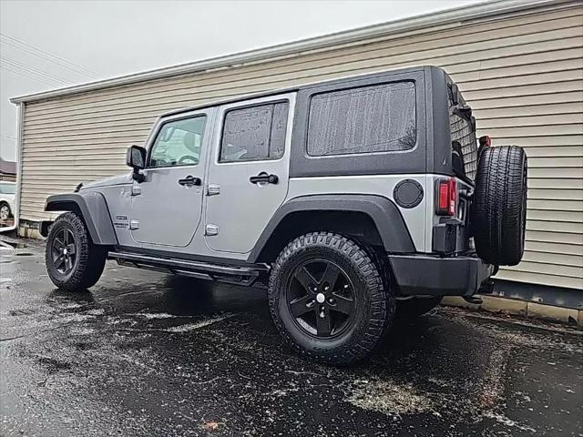 used 2015 Jeep Wrangler Unlimited car, priced at $20,675