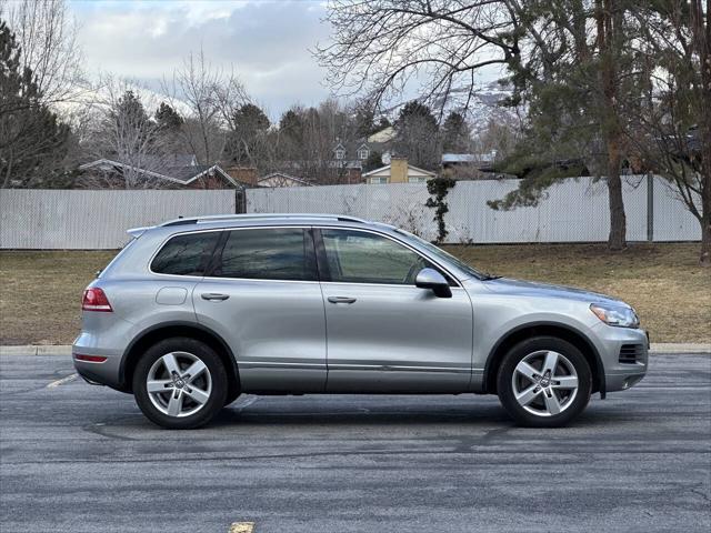 used 2013 Volkswagen Touareg Hybrid car, priced at $8,995