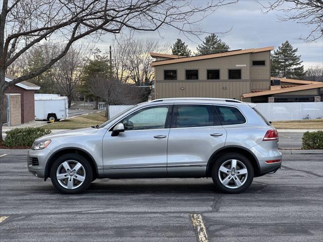 used 2013 Volkswagen Touareg Hybrid car, priced at $8,995