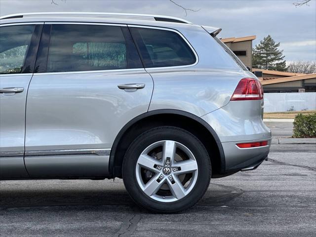 used 2013 Volkswagen Touareg Hybrid car, priced at $8,995