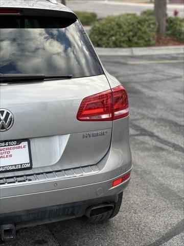 used 2013 Volkswagen Touareg Hybrid car, priced at $8,995