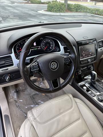 used 2013 Volkswagen Touareg Hybrid car, priced at $8,995