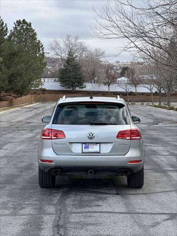 used 2013 Volkswagen Touareg Hybrid car, priced at $8,995