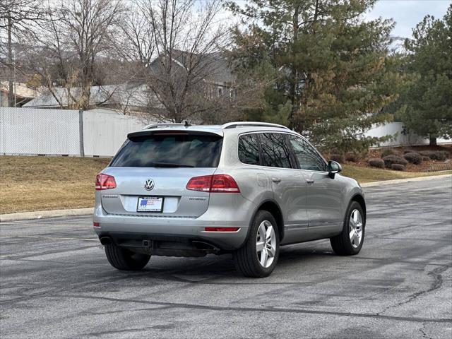 used 2013 Volkswagen Touareg Hybrid car, priced at $8,995