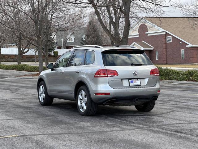 used 2013 Volkswagen Touareg Hybrid car, priced at $8,995