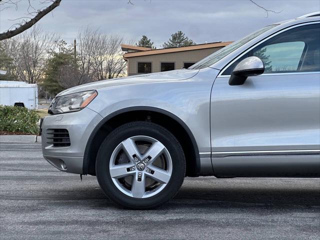 used 2013 Volkswagen Touareg Hybrid car, priced at $8,995