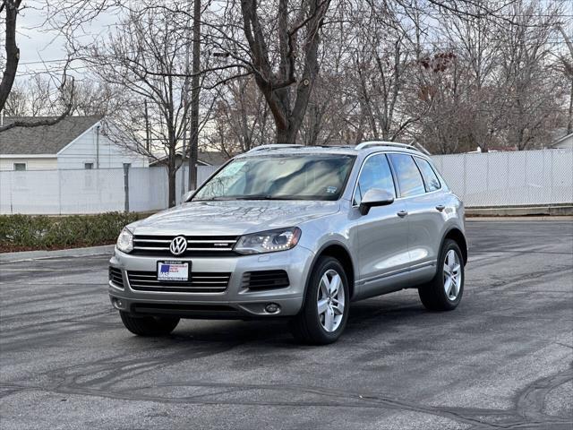 used 2013 Volkswagen Touareg Hybrid car, priced at $8,995