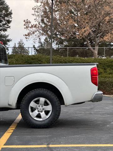 used 2013 Nissan Frontier car, priced at $9,995