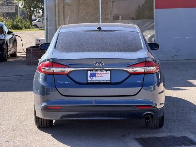 used 2018 Ford Fusion car, priced at $5,995