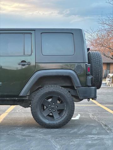 used 2010 Jeep Wrangler Unlimited car, priced at $10,995