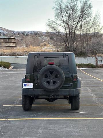 used 2010 Jeep Wrangler Unlimited car, priced at $10,995