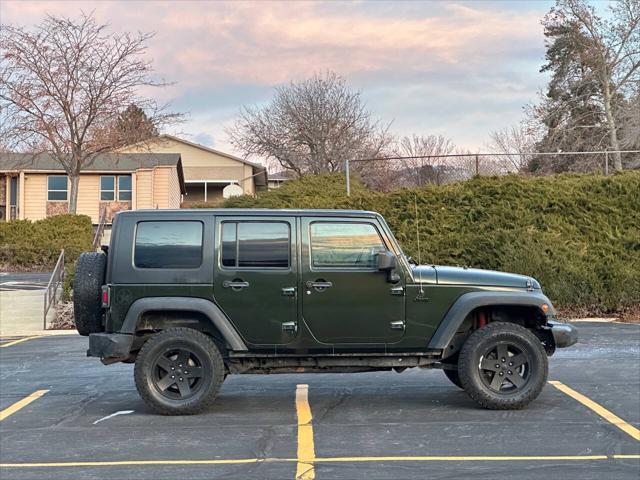 used 2010 Jeep Wrangler Unlimited car, priced at $10,995