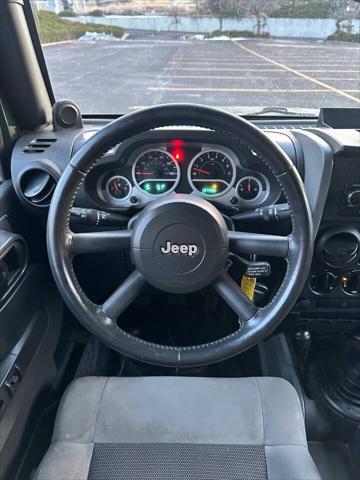 used 2010 Jeep Wrangler Unlimited car, priced at $10,995