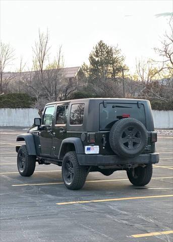 used 2010 Jeep Wrangler Unlimited car, priced at $10,995