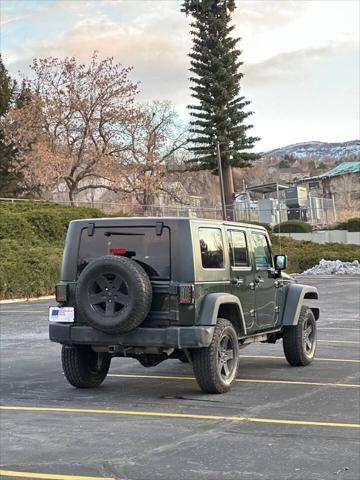 used 2010 Jeep Wrangler Unlimited car, priced at $10,995