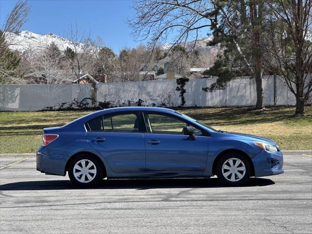 used 2014 Subaru Impreza car, priced at $6,995