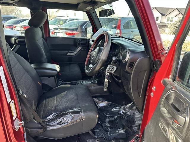 used 2012 Jeep Wrangler Unlimited car, priced at $11,995