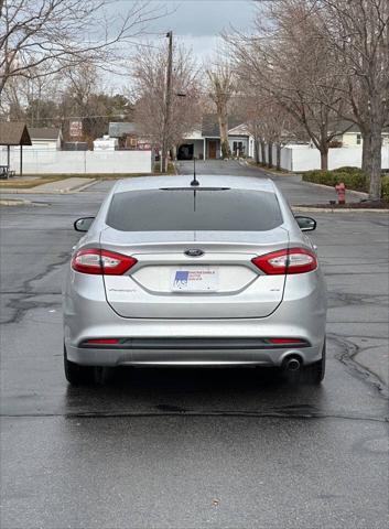 used 2014 Ford Fusion car, priced at $5,995