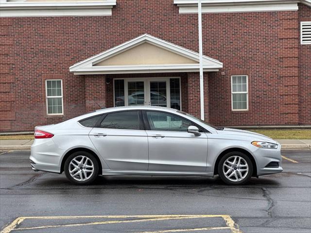 used 2014 Ford Fusion car, priced at $5,995