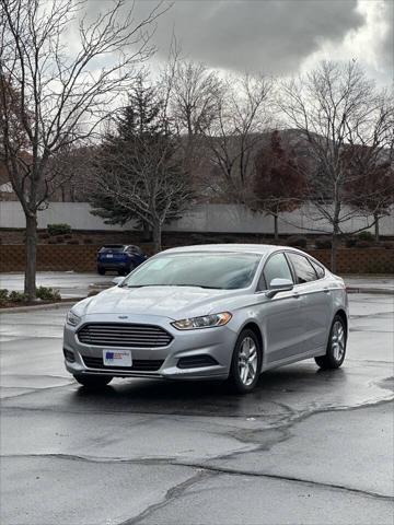 used 2014 Ford Fusion car, priced at $5,995