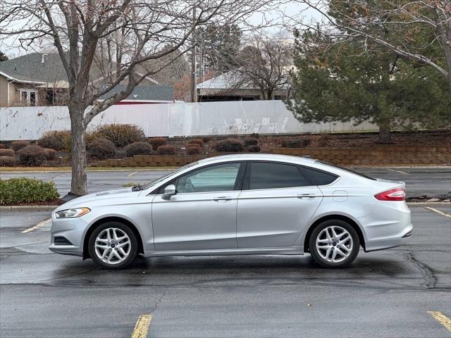 used 2014 Ford Fusion car, priced at $5,995