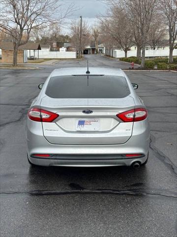 used 2014 Ford Fusion car, priced at $5,995