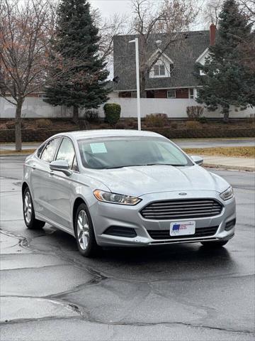 used 2014 Ford Fusion car, priced at $5,995