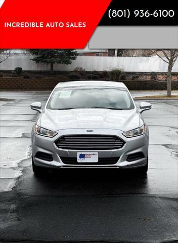 used 2014 Ford Fusion car, priced at $5,995