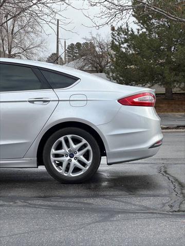 used 2014 Ford Fusion car, priced at $5,995