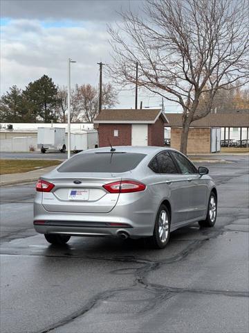 used 2014 Ford Fusion car, priced at $5,995