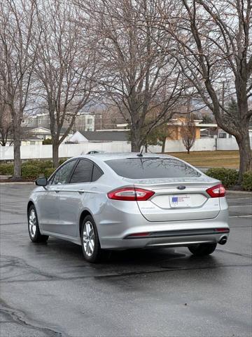 used 2014 Ford Fusion car, priced at $5,995