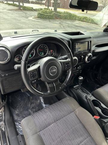 used 2011 Jeep Wrangler Unlimited car, priced at $14,995