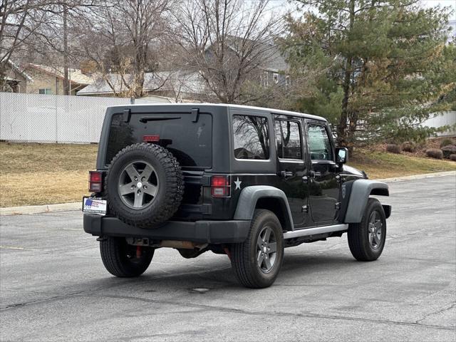 used 2011 Jeep Wrangler Unlimited car, priced at $14,995