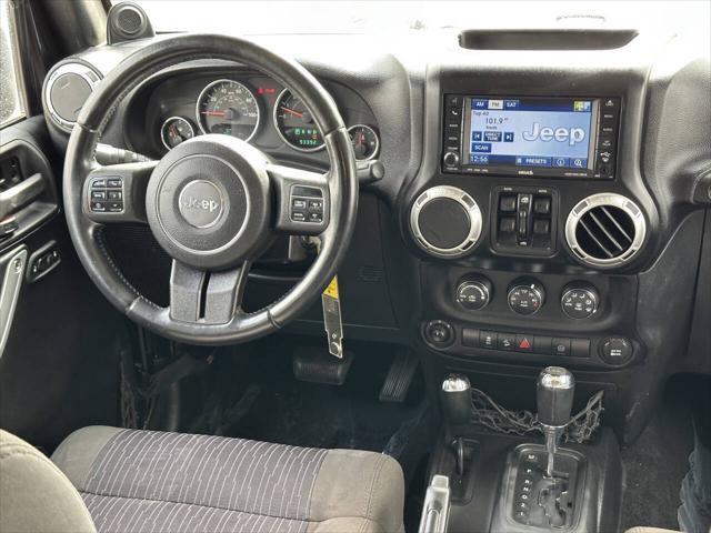 used 2011 Jeep Wrangler Unlimited car, priced at $14,995