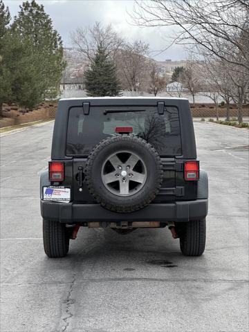 used 2011 Jeep Wrangler Unlimited car, priced at $14,995